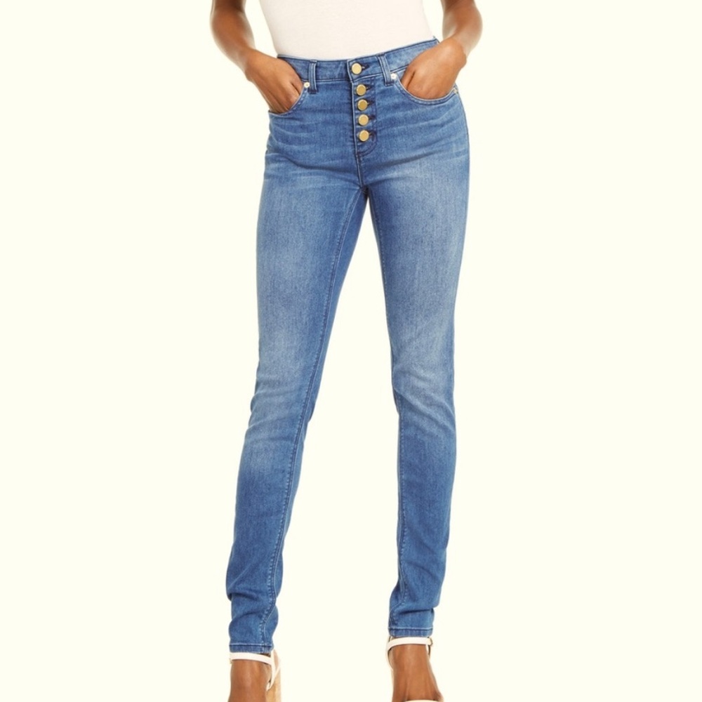 Michael Kors gold button down skinny jeans.